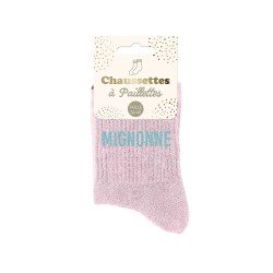 Ces chaussettes roses à paillettes avec la mention "Mignonne" en bleu sont la garantie de passer un hiver bien au chaud.